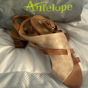 Brand new, never worn! Right from the storage bag & back in for you to enjoy!